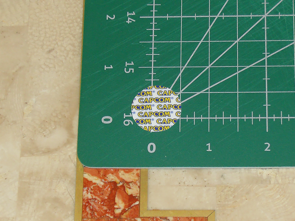 Capcom-logos-Rounded-Sticker-Security-Screw-CPS2-Board-Case-print1