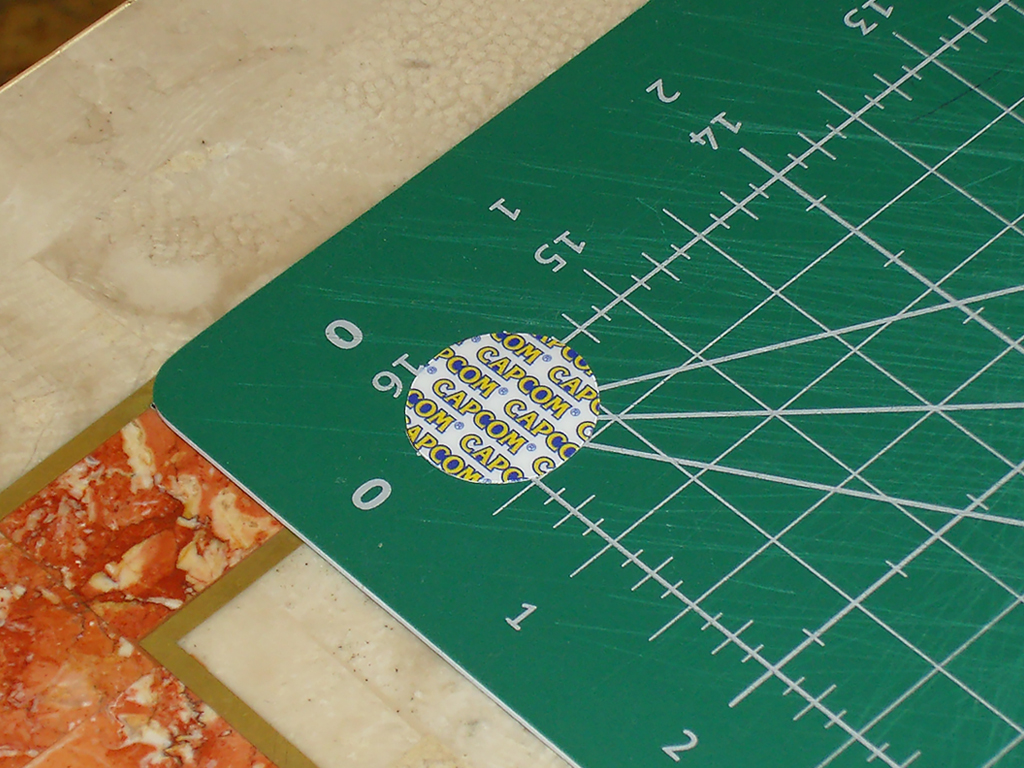 Capcom-logos-Rounded-Sticker-Security-Screw-CPS2-Board-Case-print2