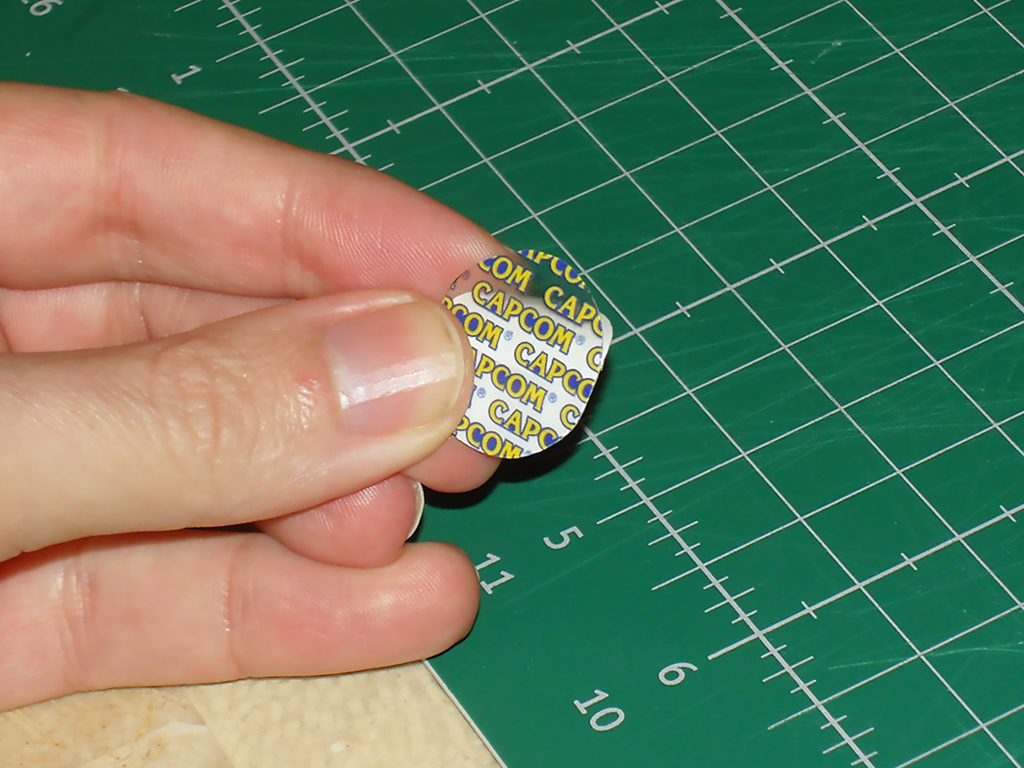 Capcom-logos-Rounded-Sticker-Security-Screw-CPS2-Board-Case-print4