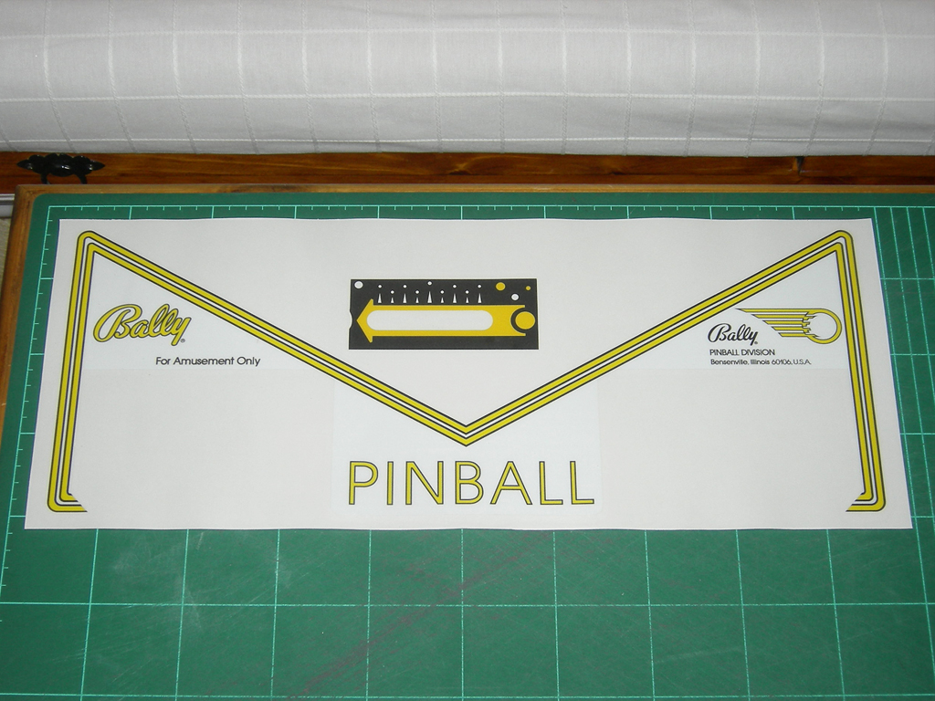 "Eight Ball Deluxe 1981 White Pinball Aprons" (BALLY) printed in vinyl