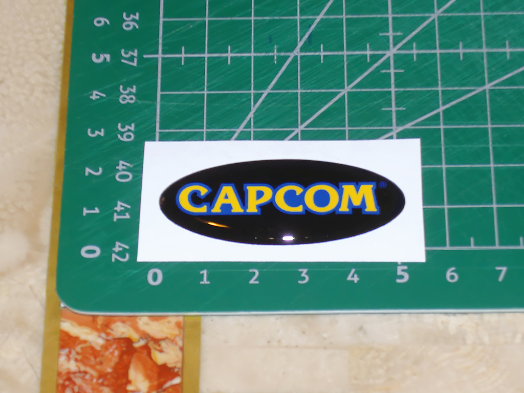 Impress-Capcom-Logo-Doming-Sticker-print1