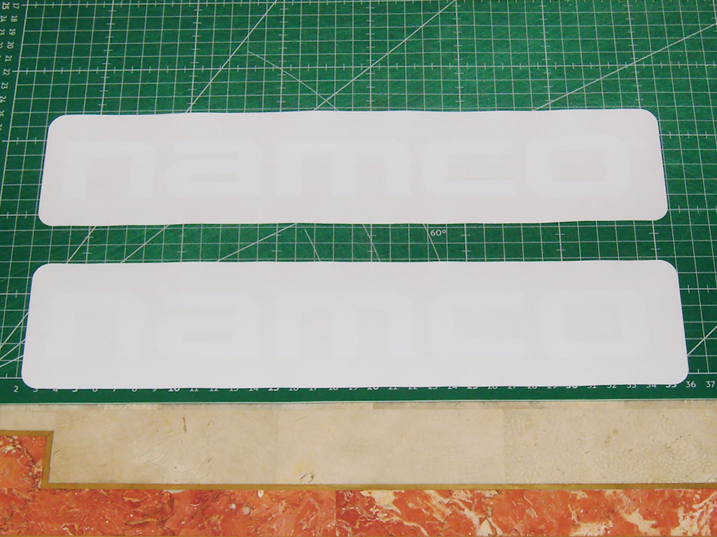 Ridge-Racer-2-White-Namco-Logo-Seat-Base-40000036-Twin-Cabinet-print1