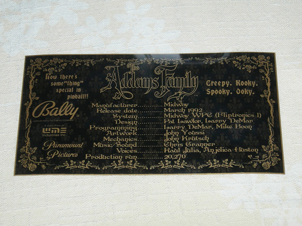 "The Addams Family Custom Pinball Cards" (BALLY) printed in gold vinyl