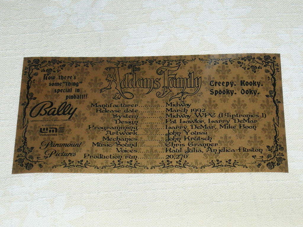 "The Addams Family Custom Pinball Cards" (BALLY) printed in gold vinyl