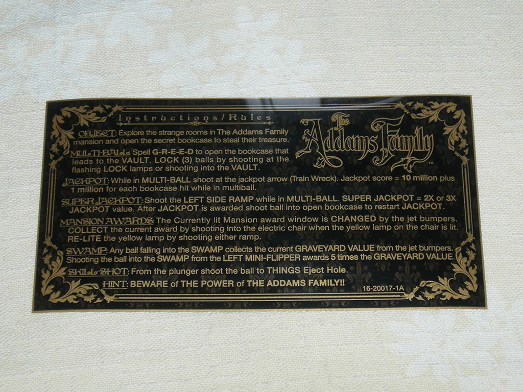 "The Addams Family Custom Pinball Cards" (BALLY) printed in gold vinyl